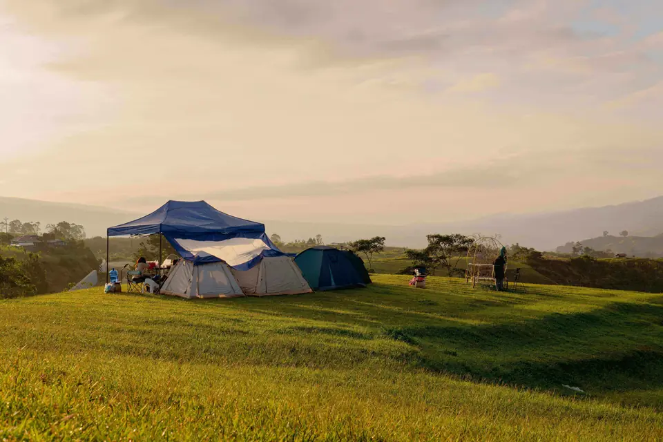 Camp tents on a hill meadow near Munnar